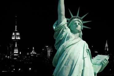 If you see this view, you know you're traveling in the United States.  Photoshopped image of the US' iconic Statue of Liberty with New York City skyscrapers in the background by a Danish photographer.